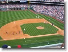 The grounds crew smoothing over the dirt.