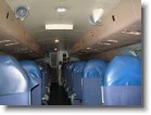 A look down the aisle in the rear cargo area (and all these seats were facing backwards which was kind of weird when we were taking off).