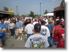 Fans swarming in the row of souvenir trailers.