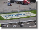 The MBNA logo painted in turn 3.