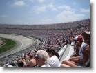 The grandstands beginning to fill up.