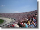 The grandstands almost full.