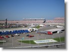 The trucks lined up next to the garage.