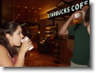 Ashley & Juston drinking coffee at the Starbucks in Trump Tower.