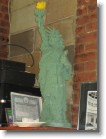 A Lego Statue of Liberty at the bar in John's Pizzeria.
