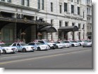 Cop cars surrounding the Plaza Hotel for an antiterrorism drill.