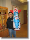 Juston holding a Bozo punching bag.