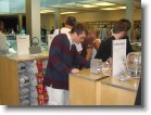 Math looking at an iPod at the Apple Store in SoHo.