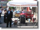 An opera singer on the street in Little Italy.