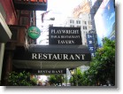 The sign outside the Playwright Bar in Times Square.