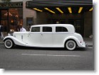 A Rolls Royce limo outside NBC Studios.