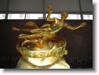 An even-closer-up image of that crazy golden statue.