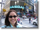 Ashley, in front of the NASDAQ sign.