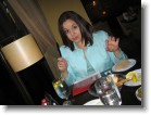 Ashley, buttering her bread inside Rock Center Cafe.