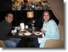 Juston & Ashley as seen by our waiter inside Rock Center Cafe.